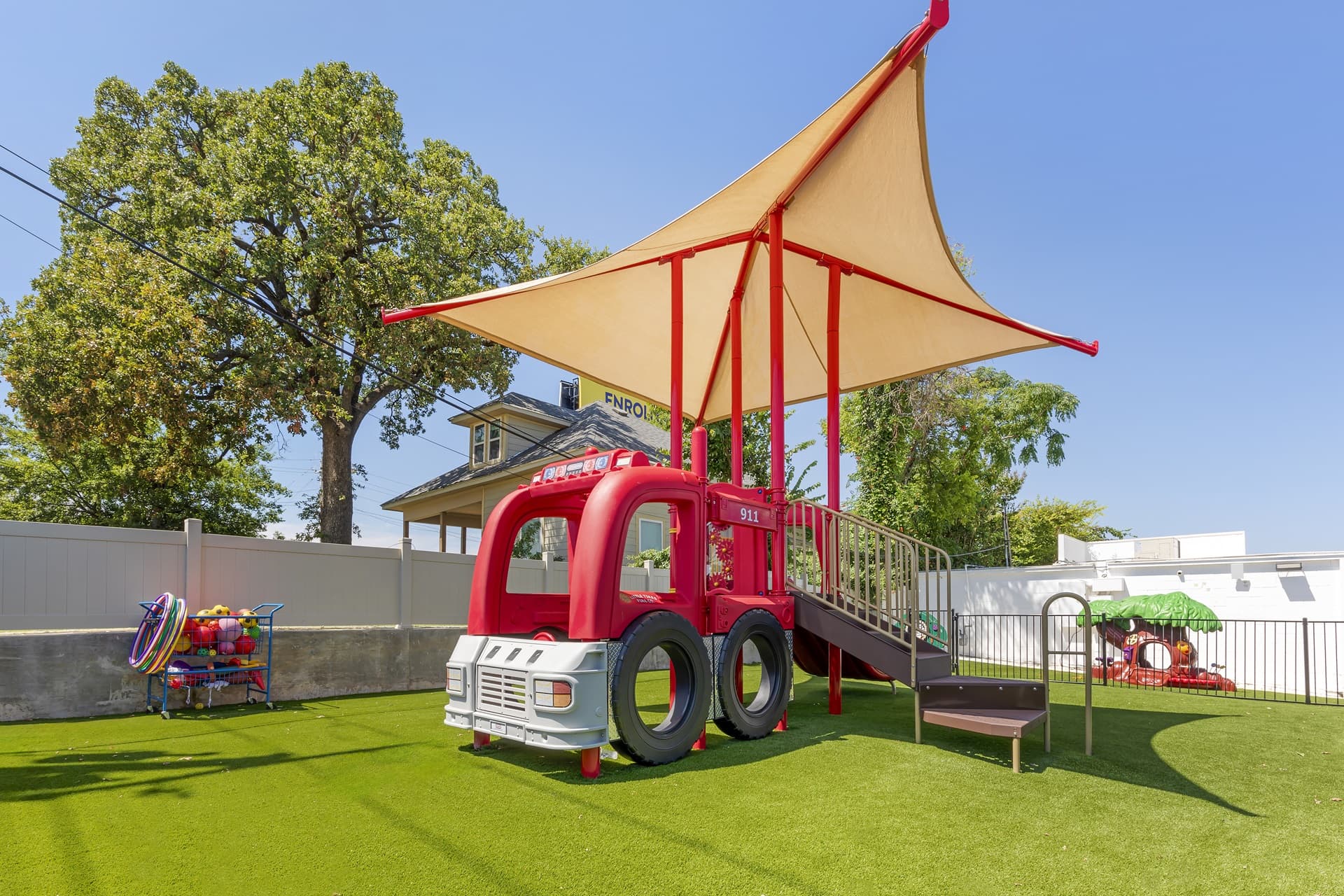 playground featuring red truck jungle gym