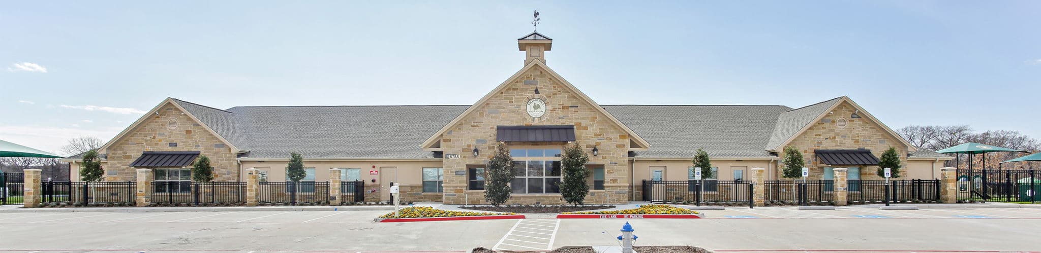 image of the exterior front of Primrose School of Plano at Headquarters