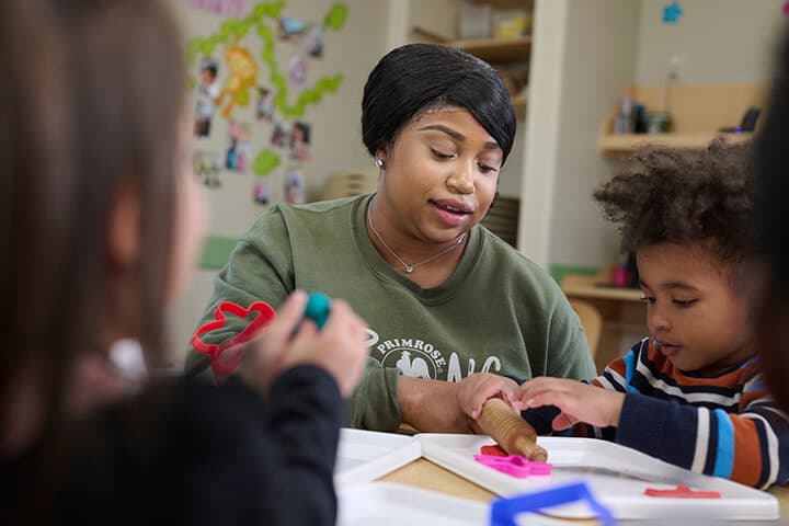 teacher working with a preschool child