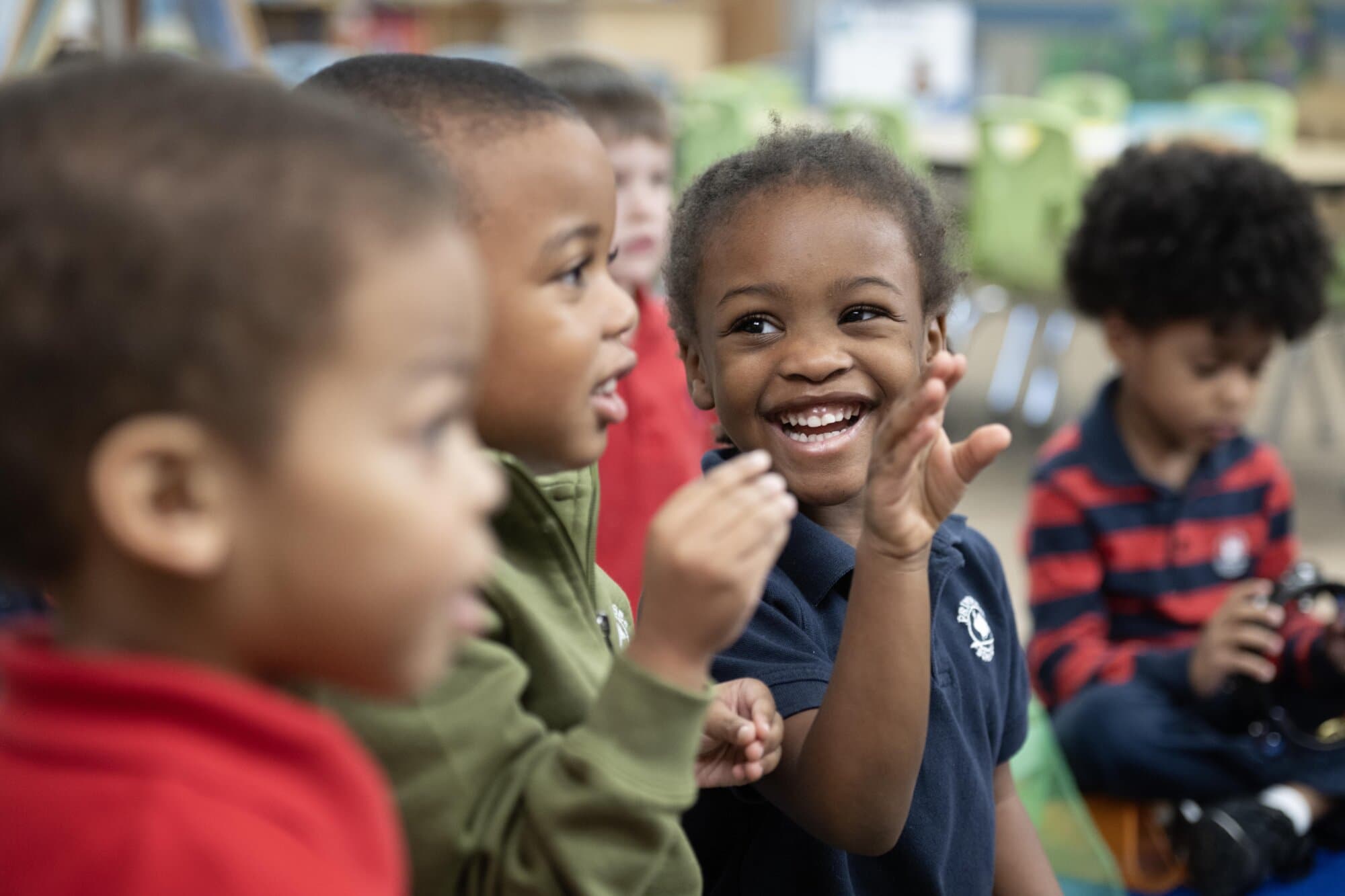 prekindergarten children smiling in class