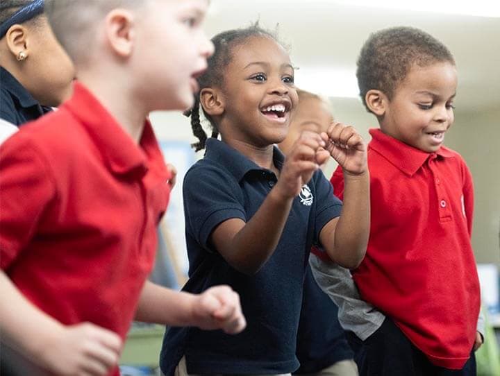 children playing in a classroom