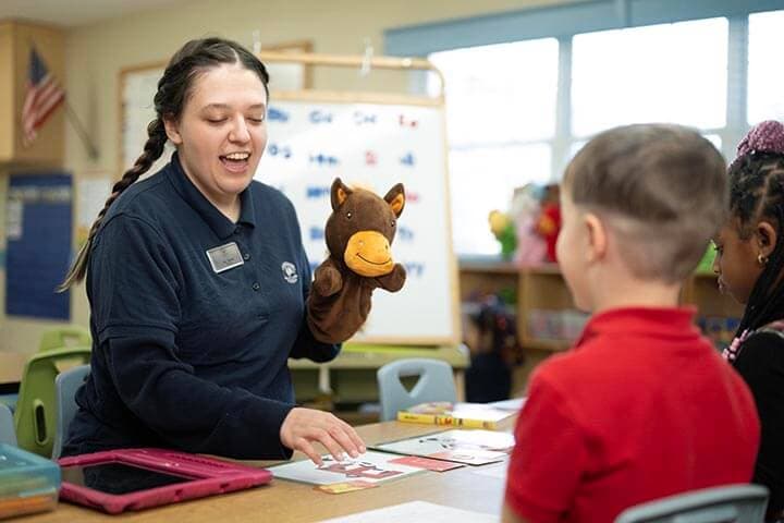 child engaging in classroom activity