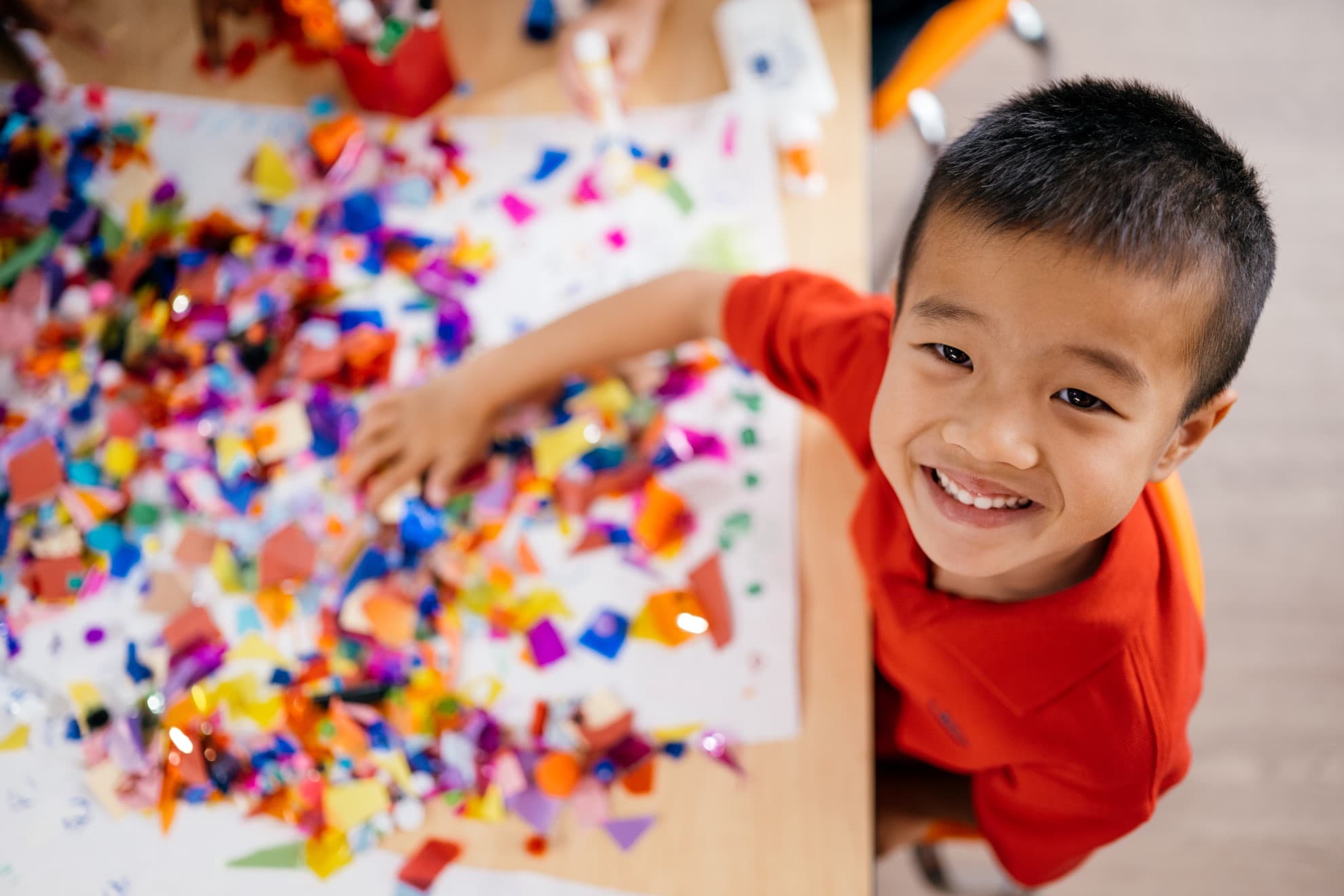 Pre-kindergartener doing an art project