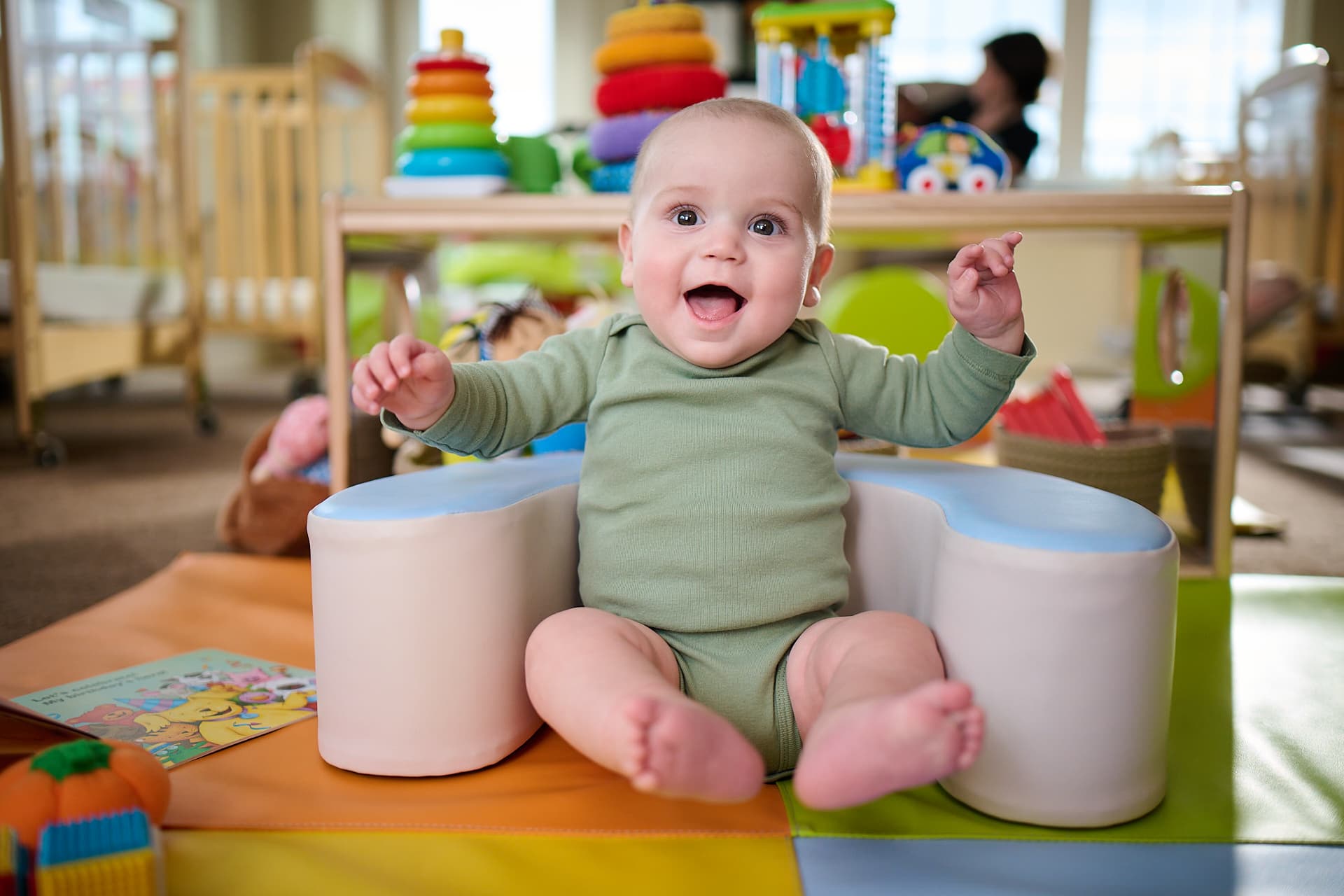 infant playing in class