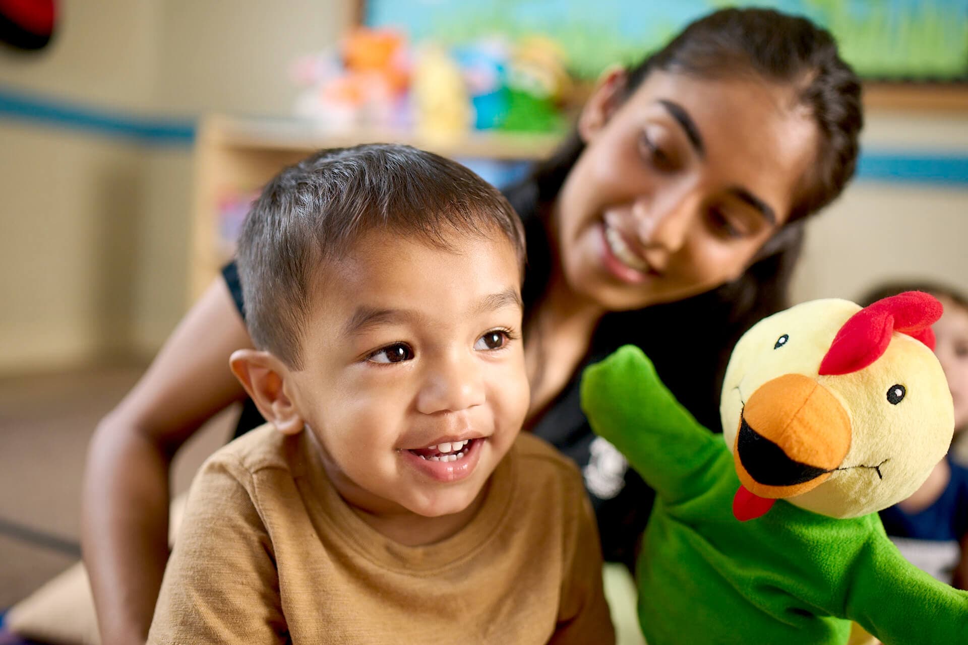 Primrose learning from puppets in class