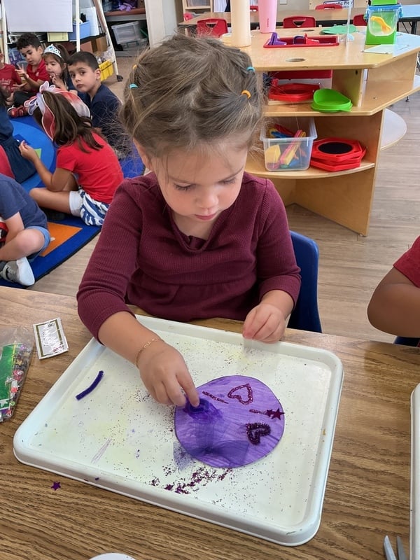 Pre-K making purple belongingness Day circles