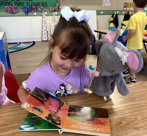 Reading with Mia the mouse