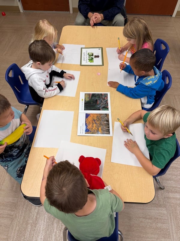 Children learning at a small group setting. 