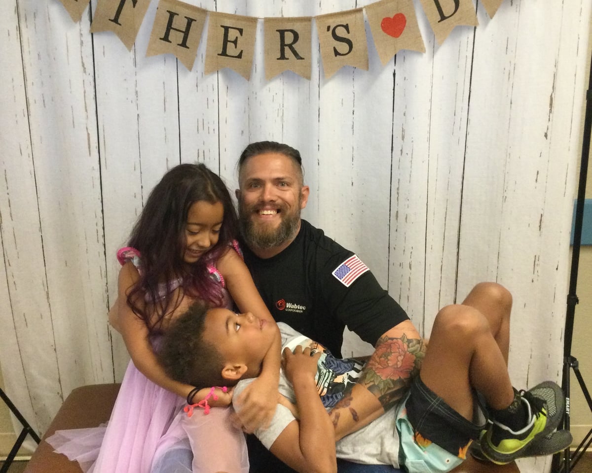 Dad with his 2 children