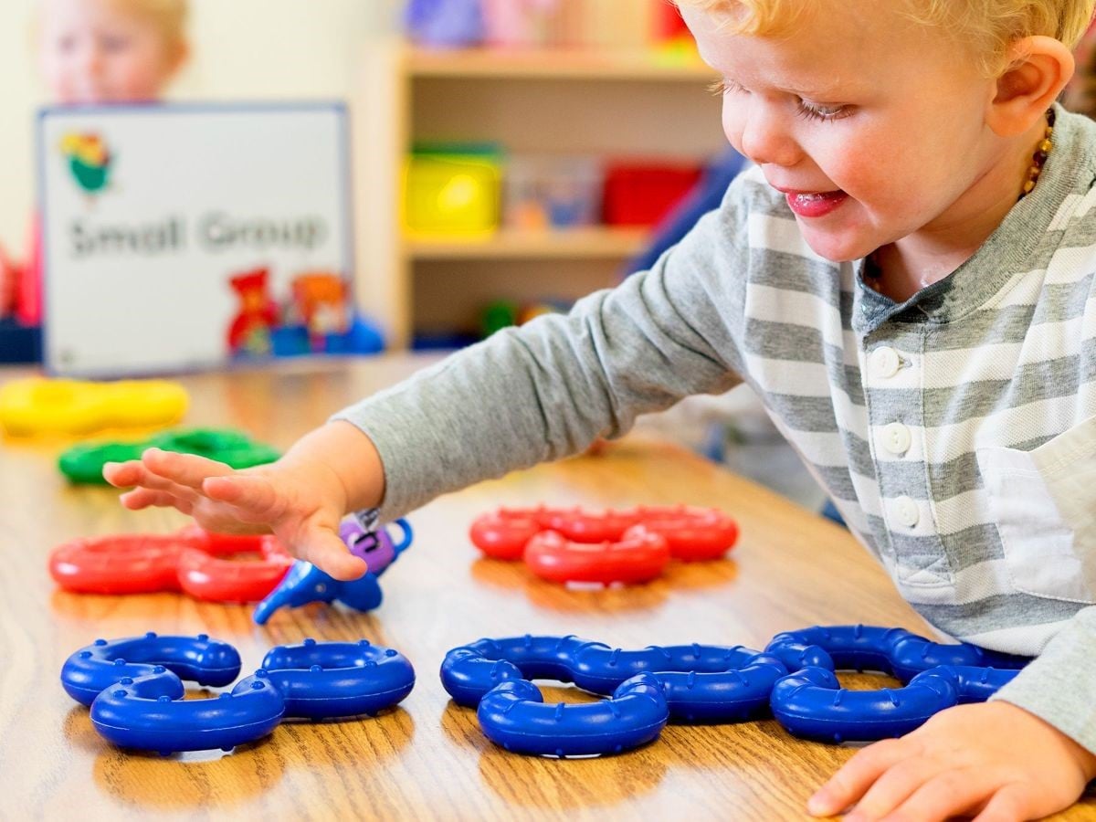 Student playing in classroom