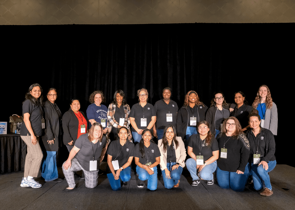 two rows of women pose