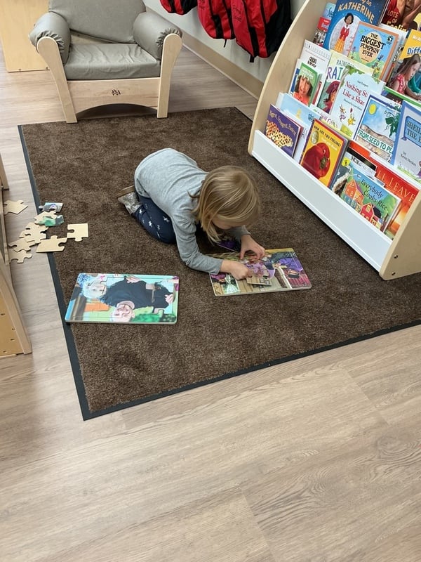 Primrose School students developing a love of reading during classroom storytime