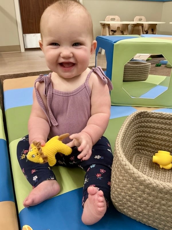 Smiles all around! At Primrose, we nurture every little moment of joy and discovery in our infant classrooms.