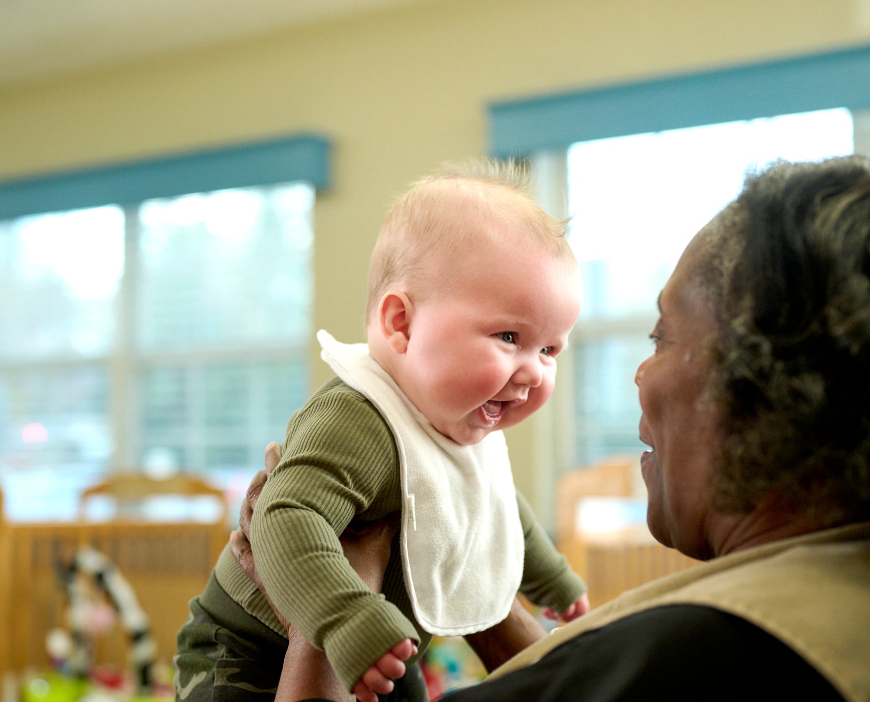 Primrose teacher talking to baby