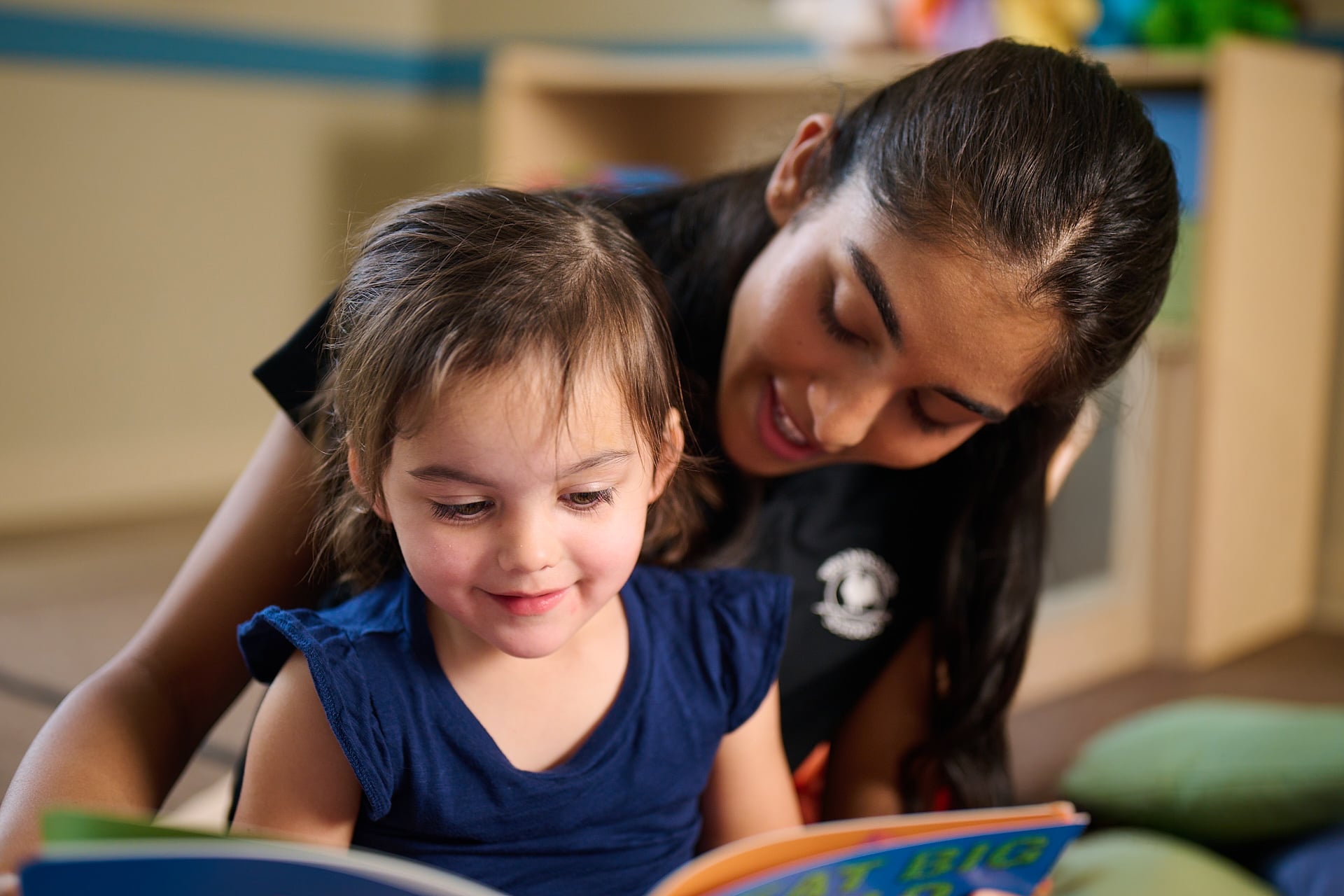 Primrose teacher reading to student