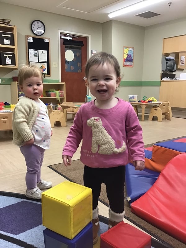 Child stacking blocks