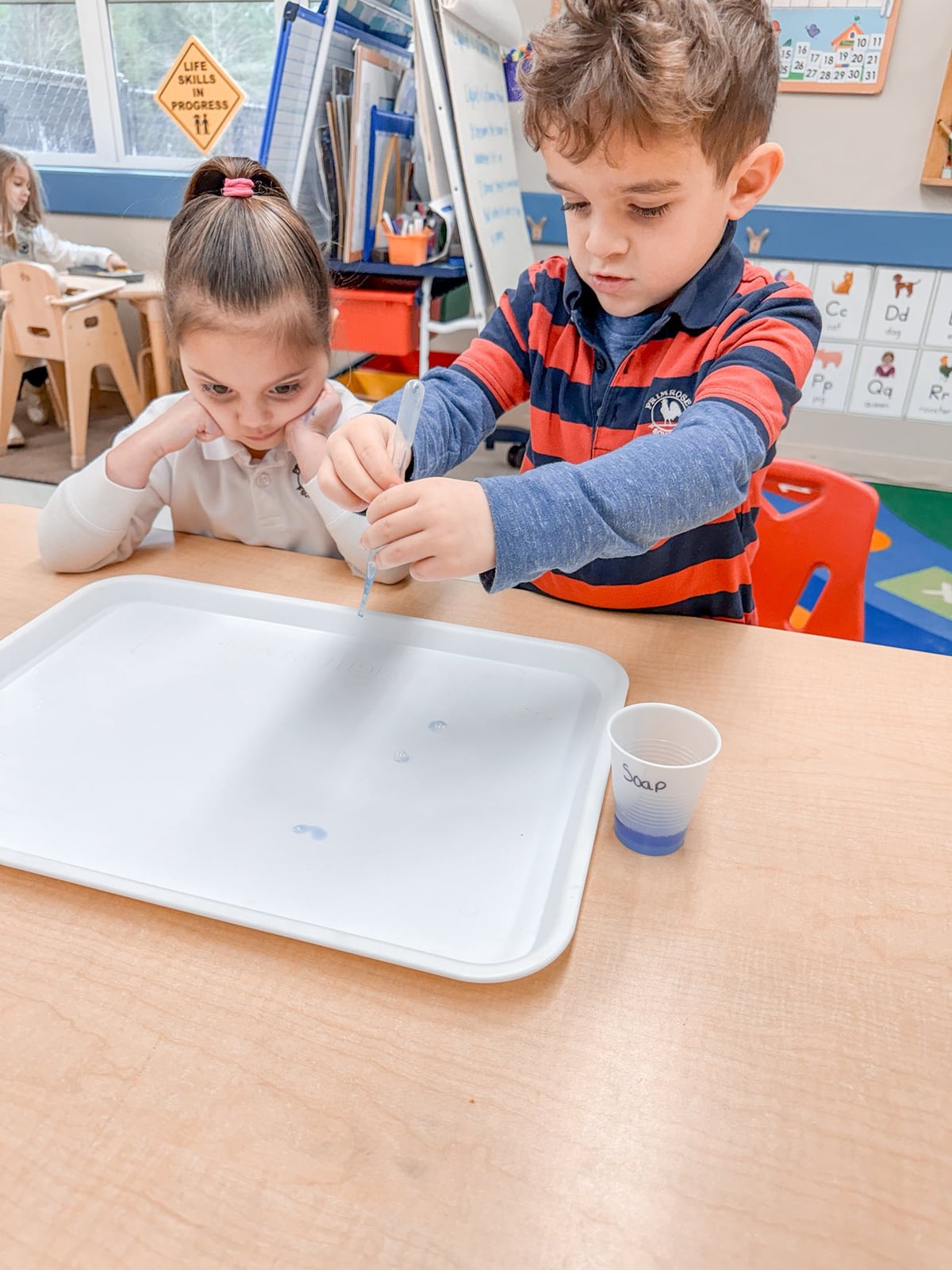 Pre-K students learning about liquid