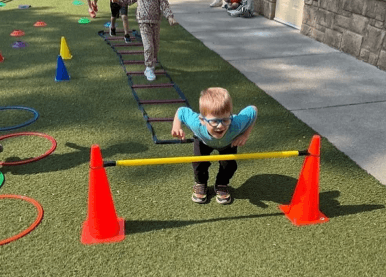 photo of child jumping