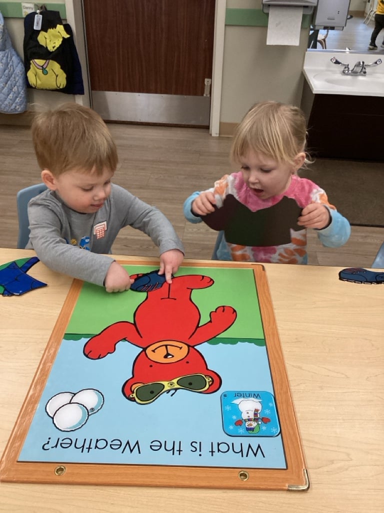 children using weather board
