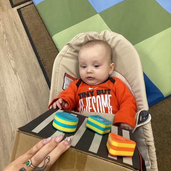 Baby playing with shapes