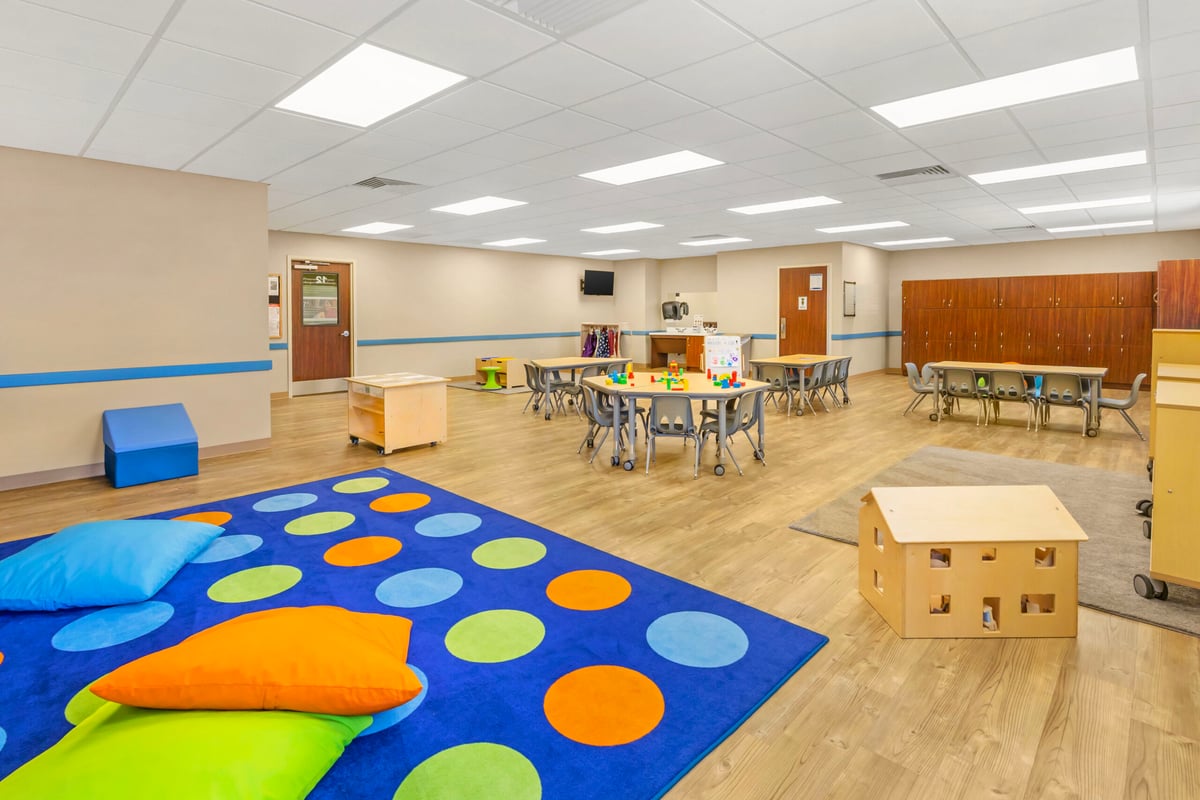 Summer camp for school aged children in a big spacious room with STEAM curriculum