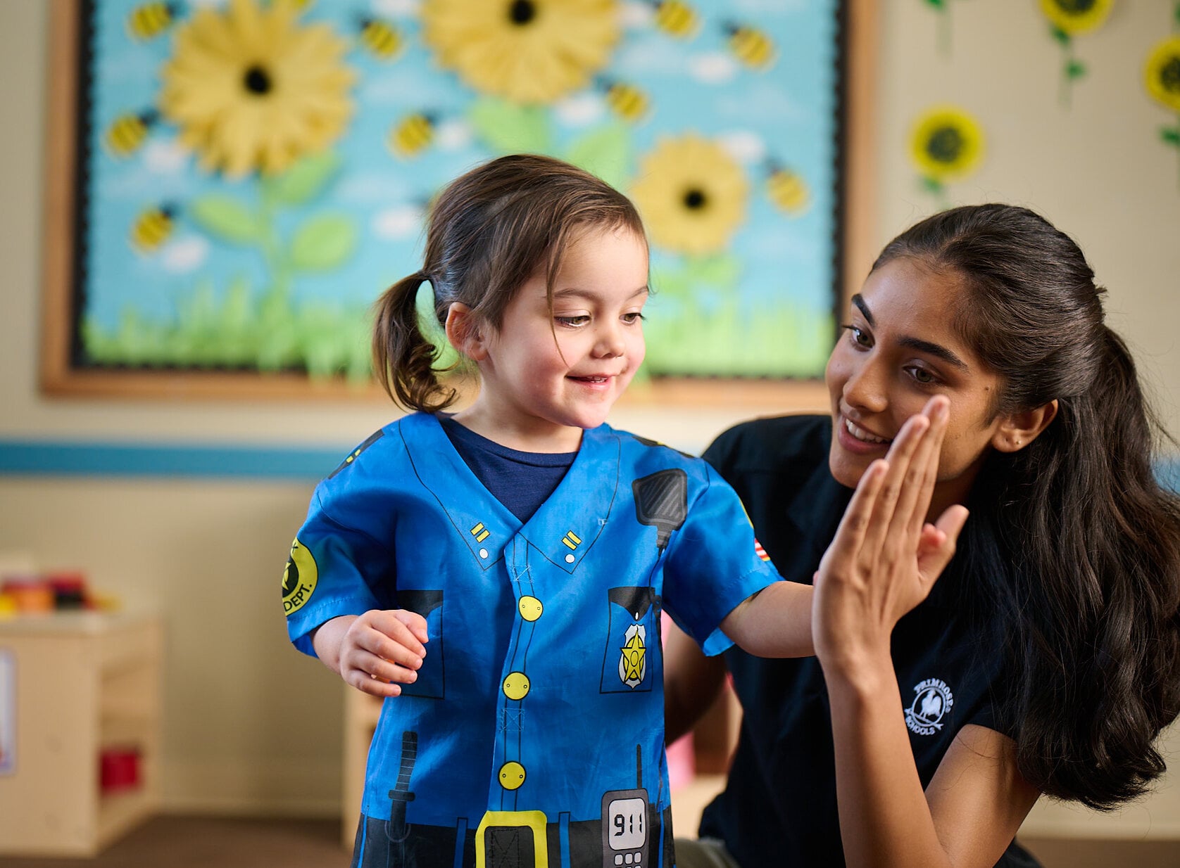 preschooler playing dress-up