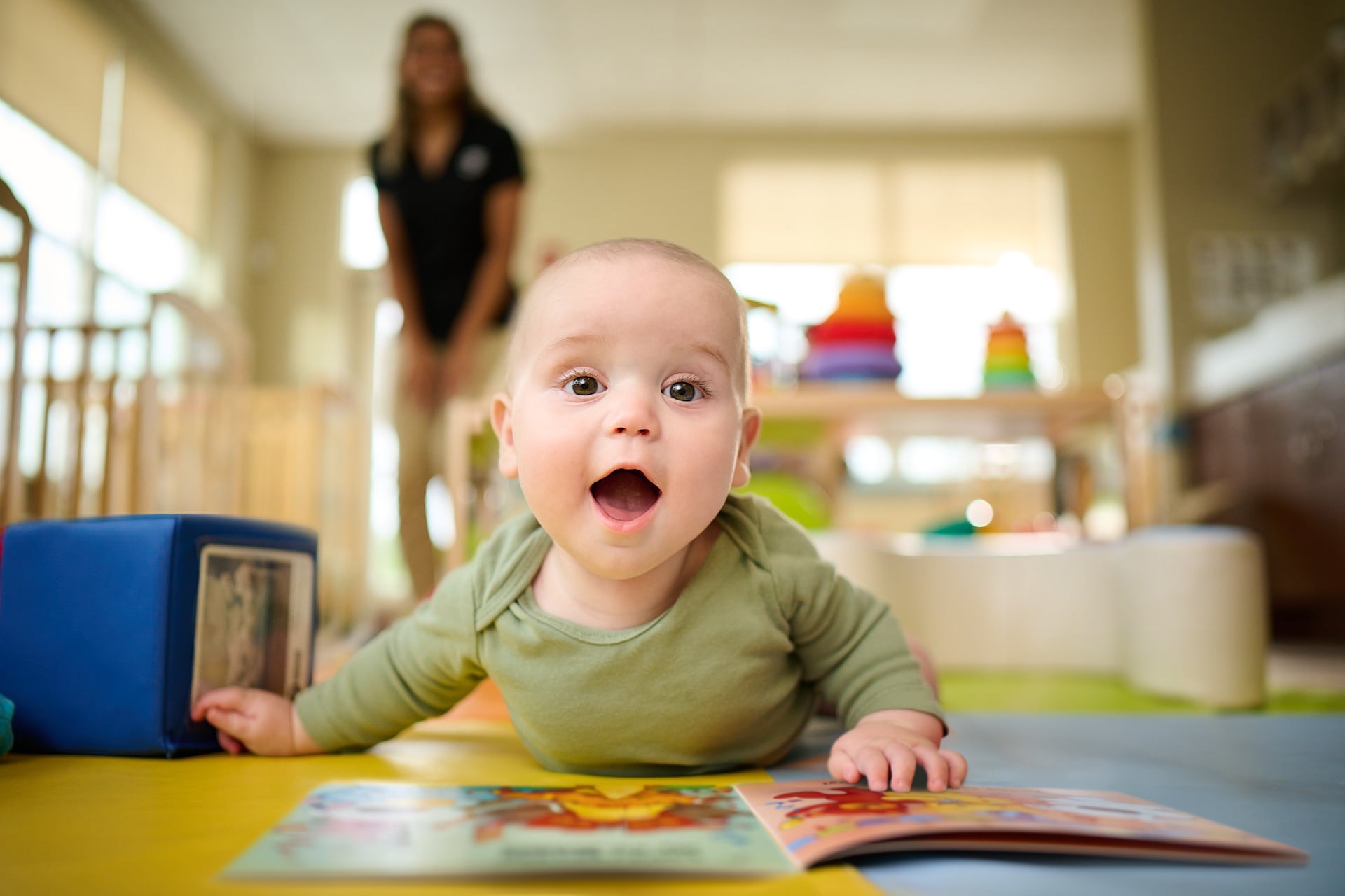baby looking at book