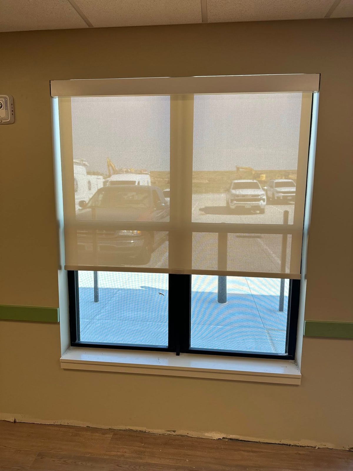 A picture of blinds located in one of the classrooms.