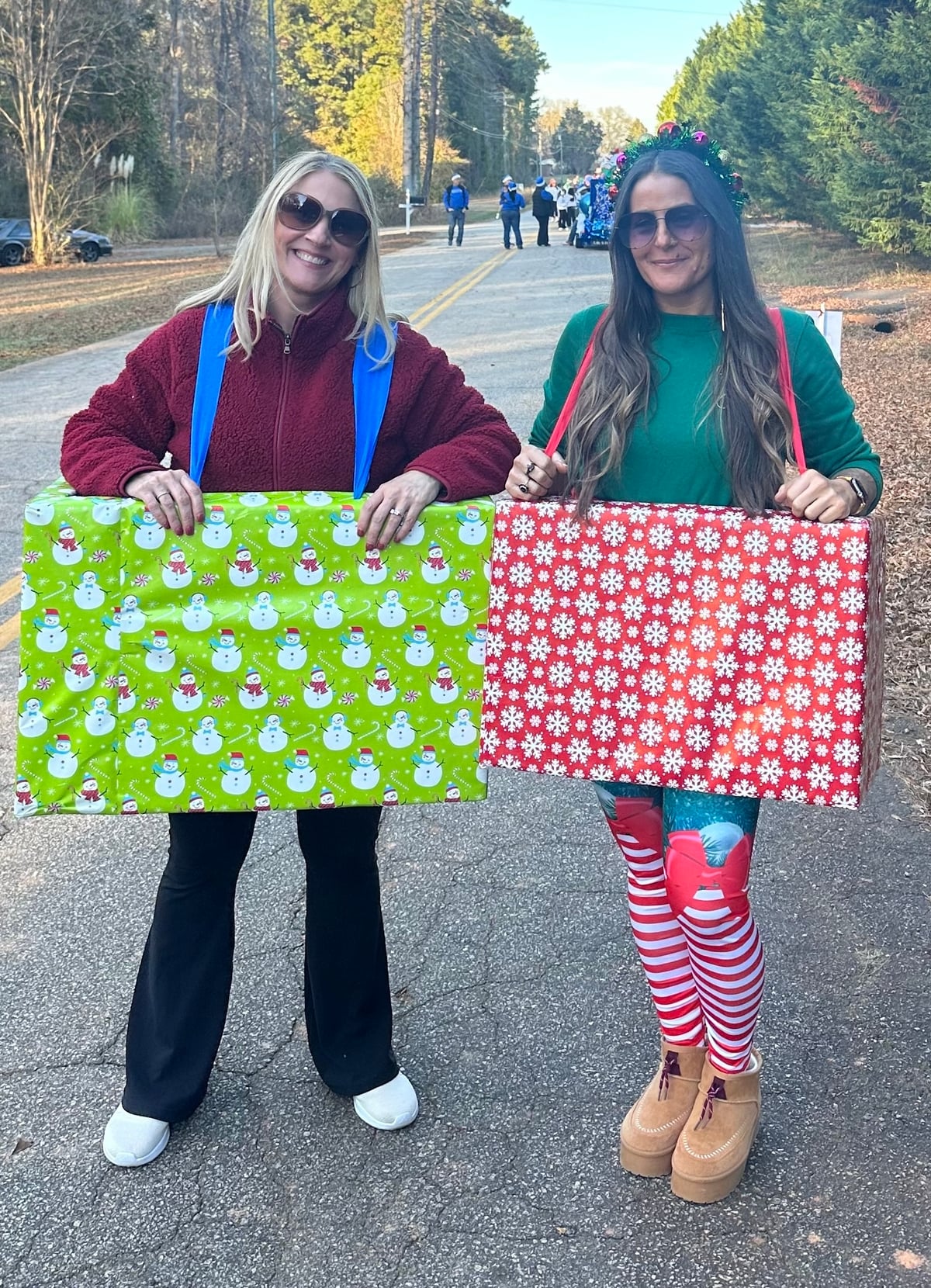 Primrose waxhaw leadership team dressed up as gift boxes for christmas parade