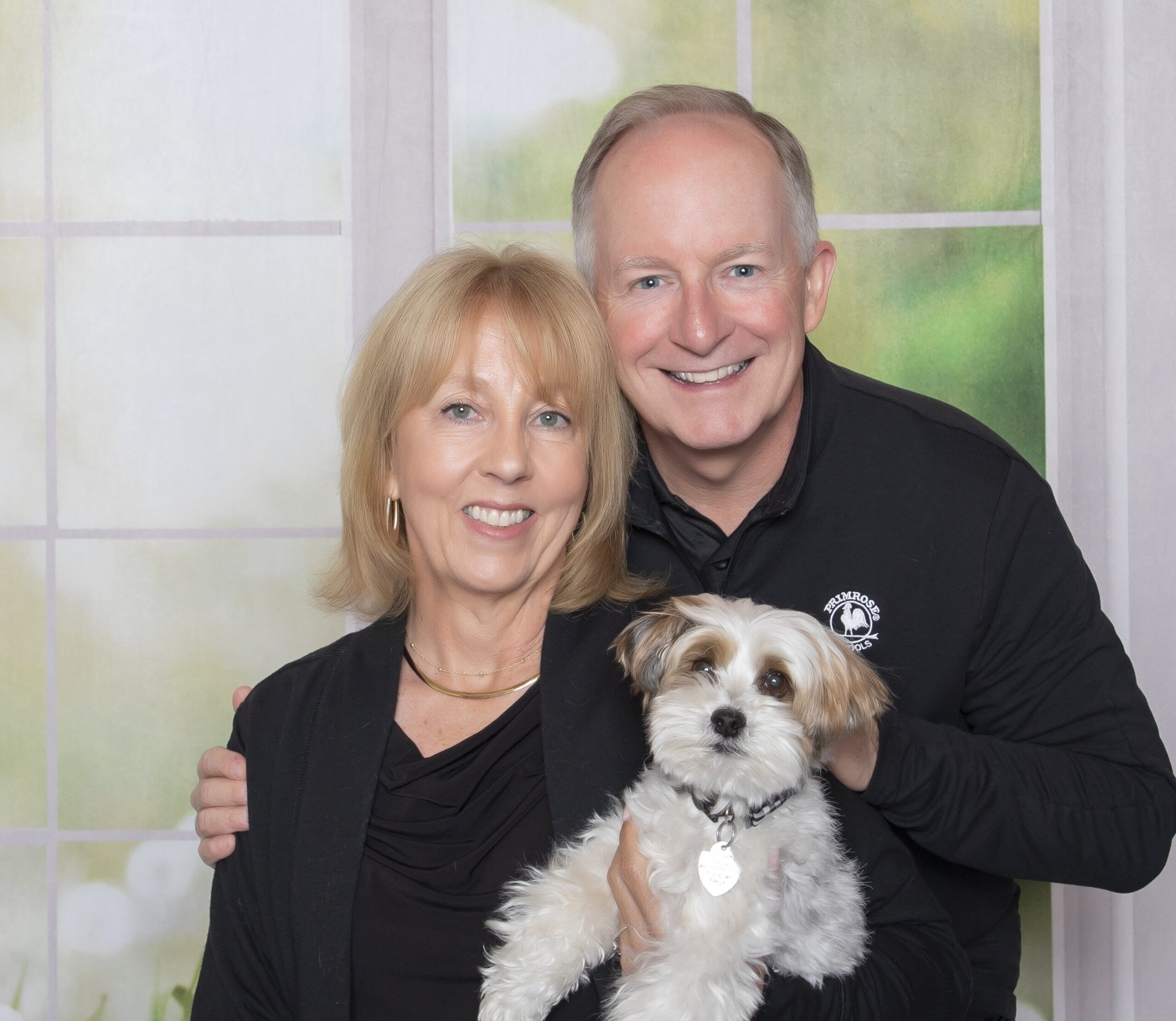 Portrait of Rob and Deanne Fitzpatrick with Teddy