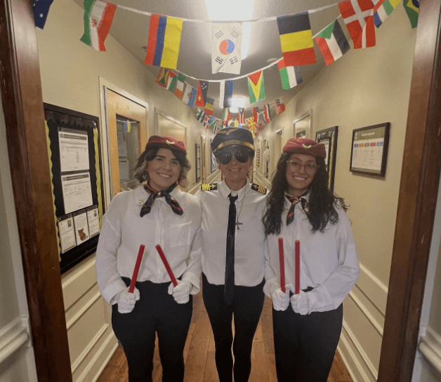 admin dressed as flight attendants